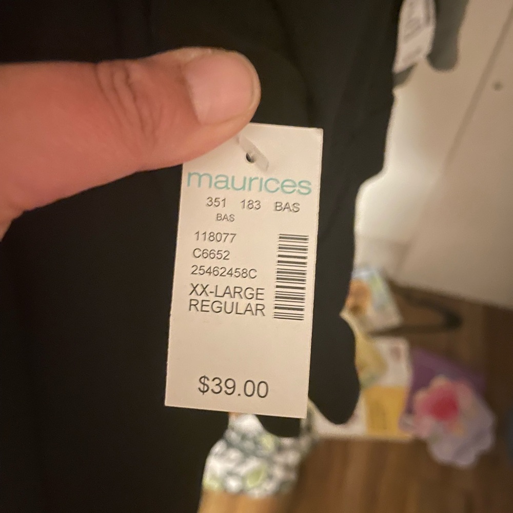 Selling three brand new pairs of XXL pull up dress pants never worn.
